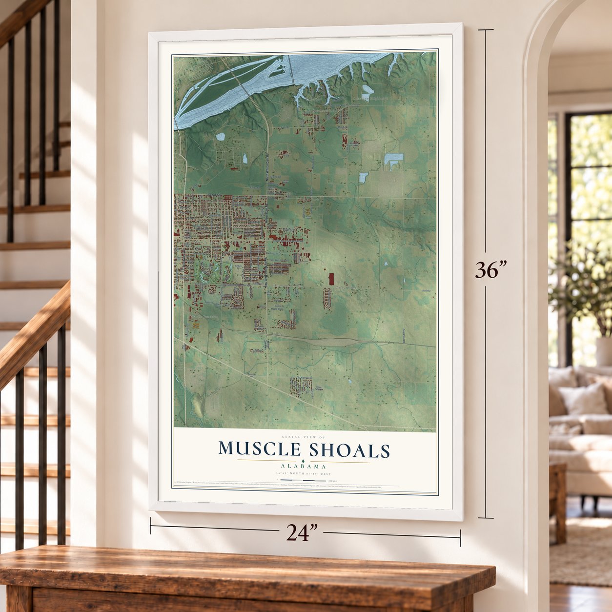 Muscle Shoals, Alabama map, 24 x 36 inch print in a white frame by a staircase