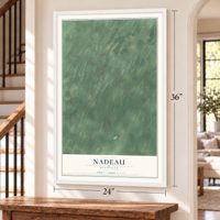 Nadeau, Michigan map, 24 x 36 inch print in a white frame by a staircase
