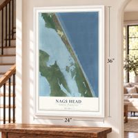 Nags Head, North Carolina map, 24 x 36 inch print in a white frame by a staircase