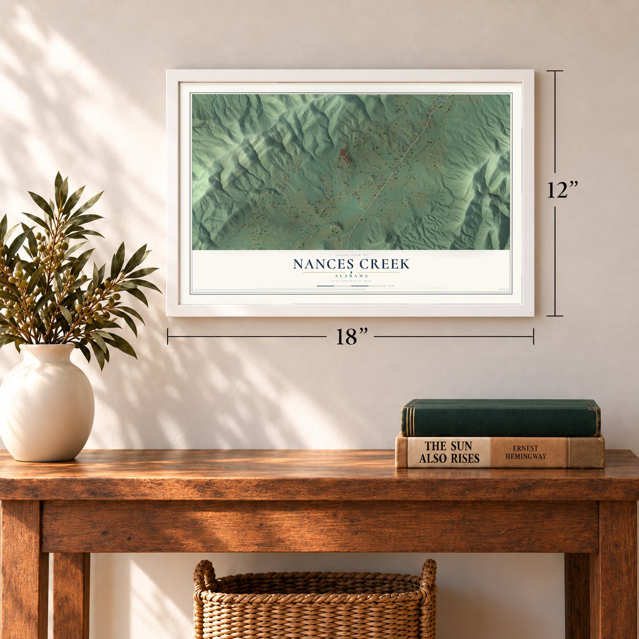 Nances Creek, Alabama map, 12 x 18 inch print in a white frame in an entryway