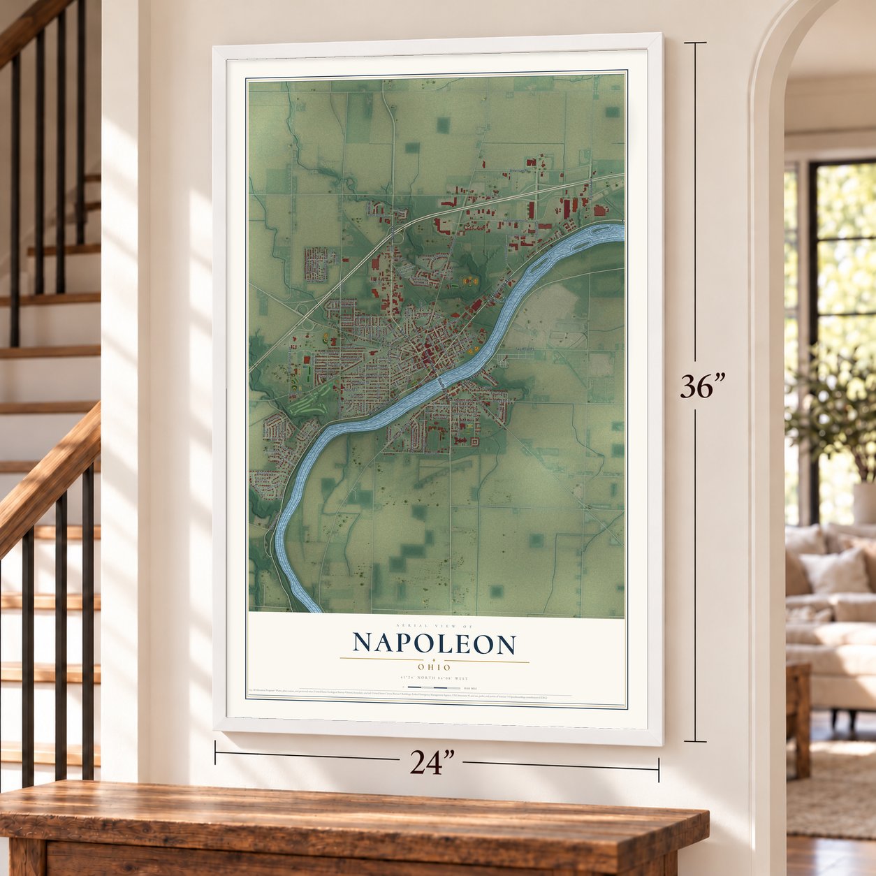 Napoleon, Ohio map, 24 x 36 inch print in a white frame by a staircase