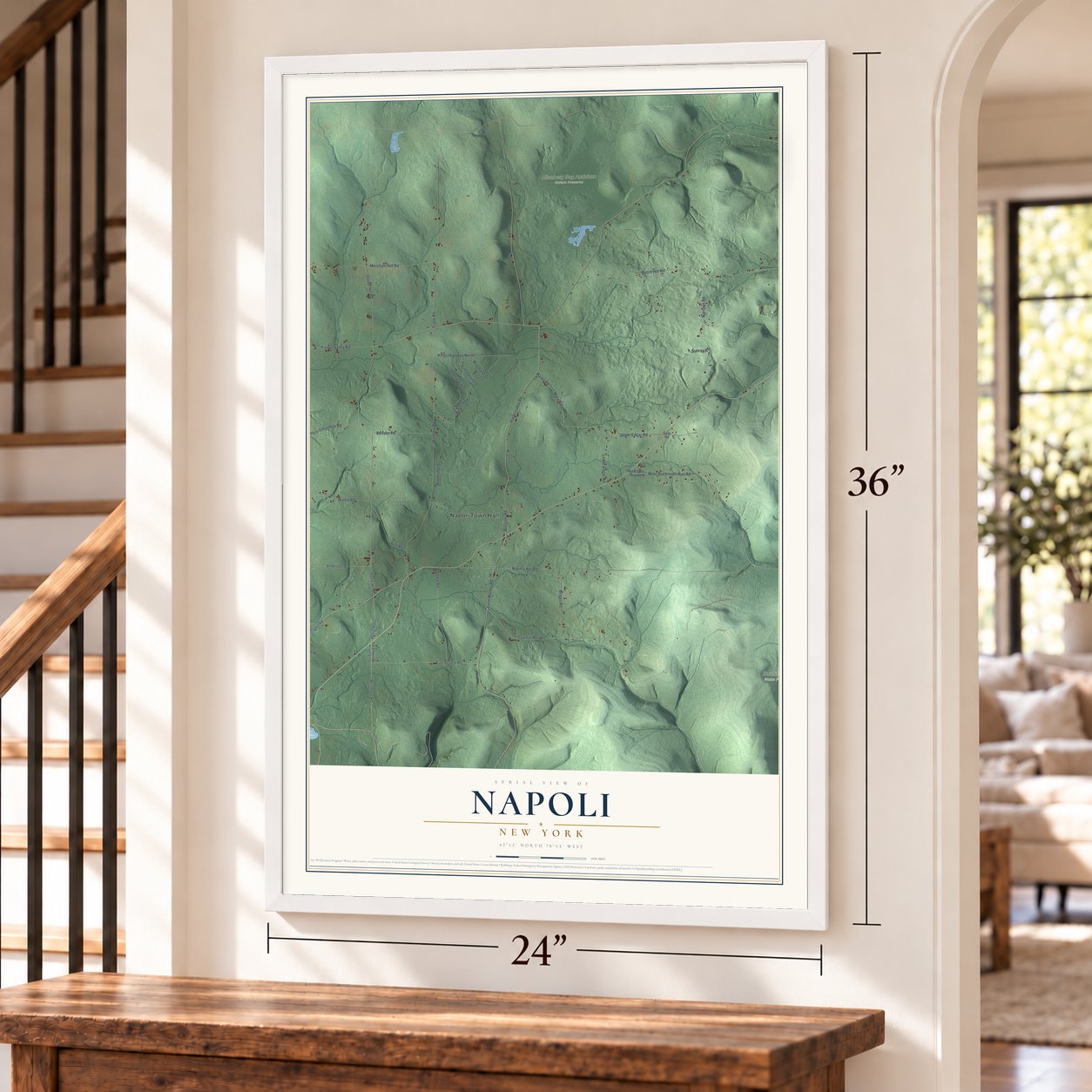 Napoli, New York map, 24 x 36 inch print in a white frame by a staircase