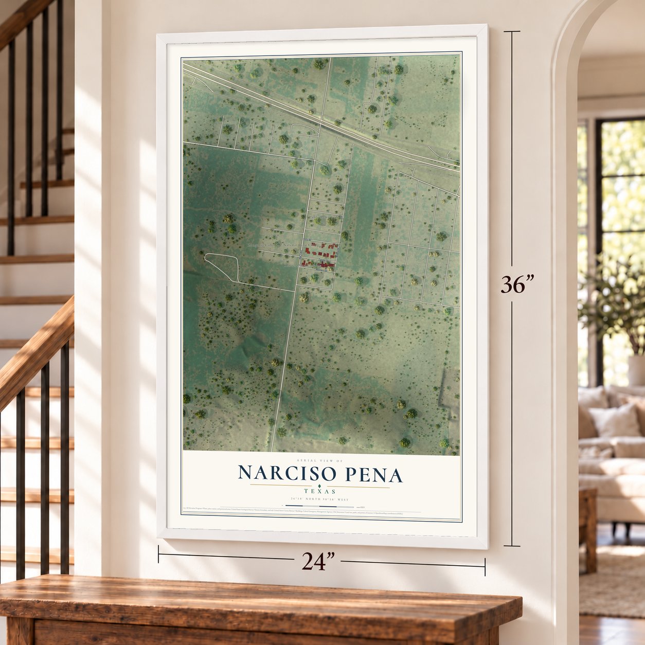 Narciso Pena, Texas map, 24 x 36 inch print in a white frame by a staircase