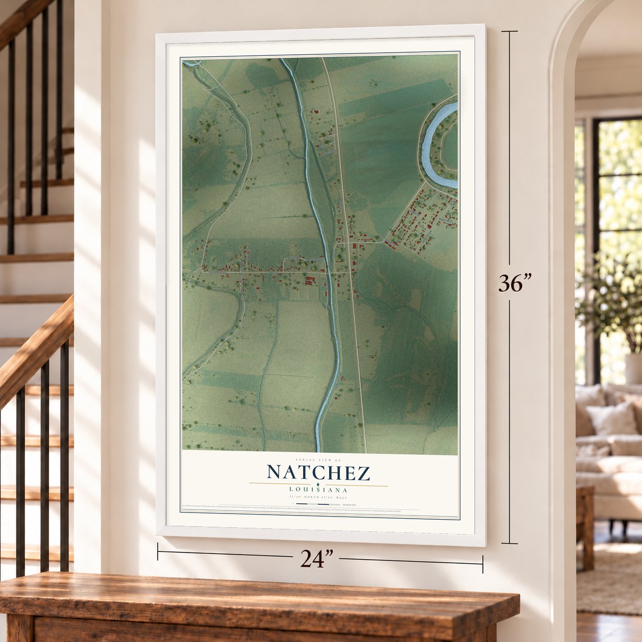 Natchez, Louisiana map, 24 x 36 inch print in a white frame by a staircase
