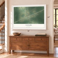 Naylor, Georgia map, 24 x 36 inch print in a white frame above a dresser by a staircase