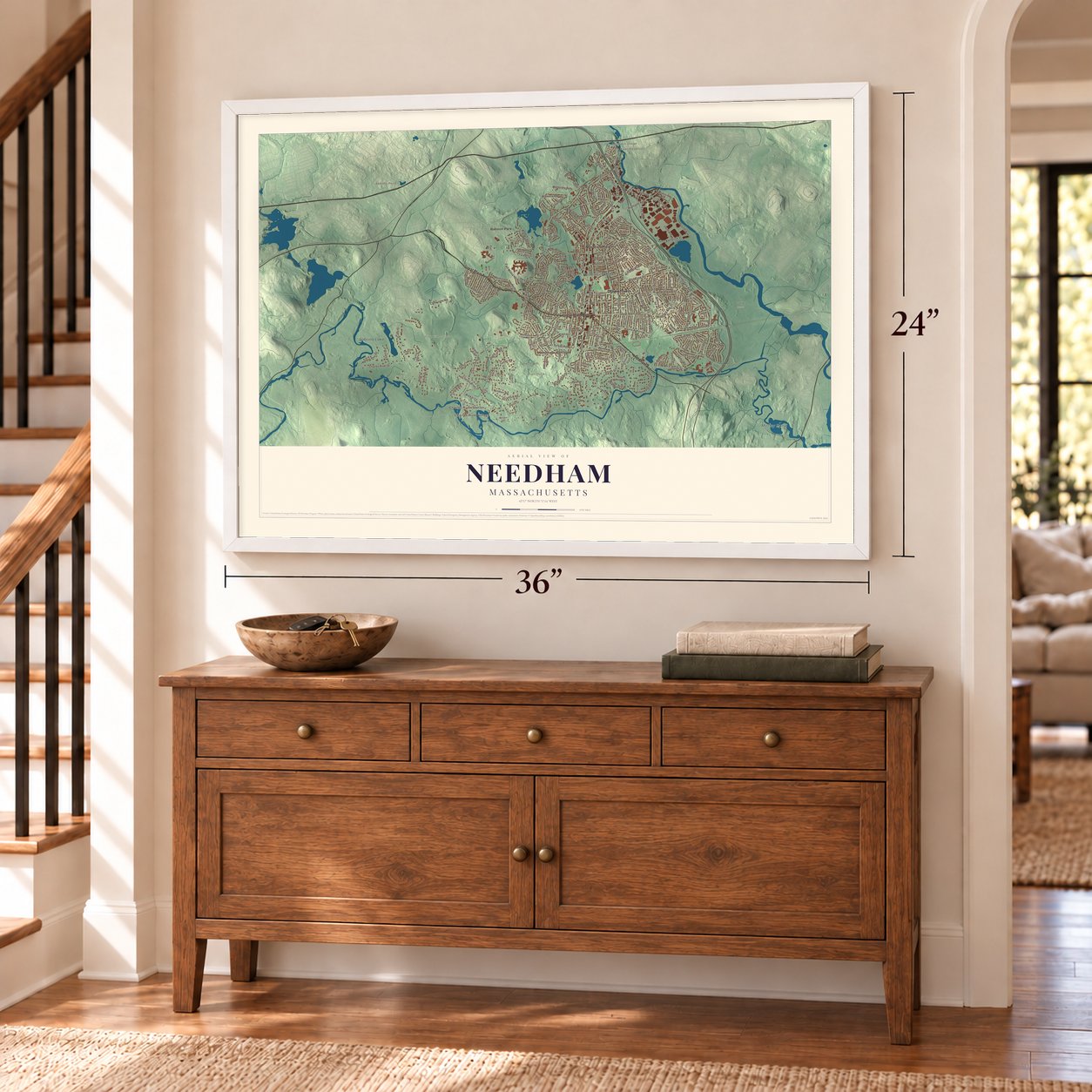 Needham, Massachusetts map, 24 x 36 inch print in a white frame above a dresser by a staircase