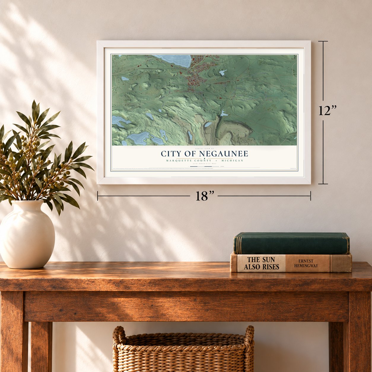 Negaunee, Michigan map, 12 x 18 inch print in a white frame in an entryway
