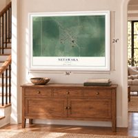 Netawaka, Kansas map, 24 x 36 inch print in a white frame above a dresser by a staircase