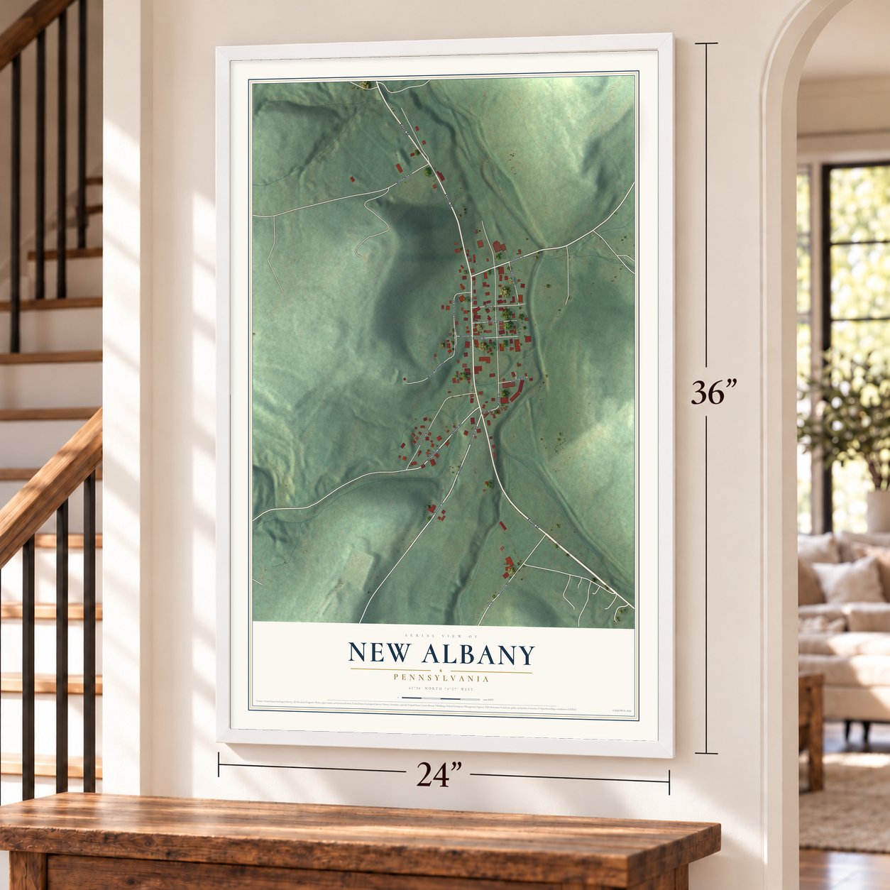 New Albany, Pennsylvania map, 24 x 36 inch print in a white frame by a staircase