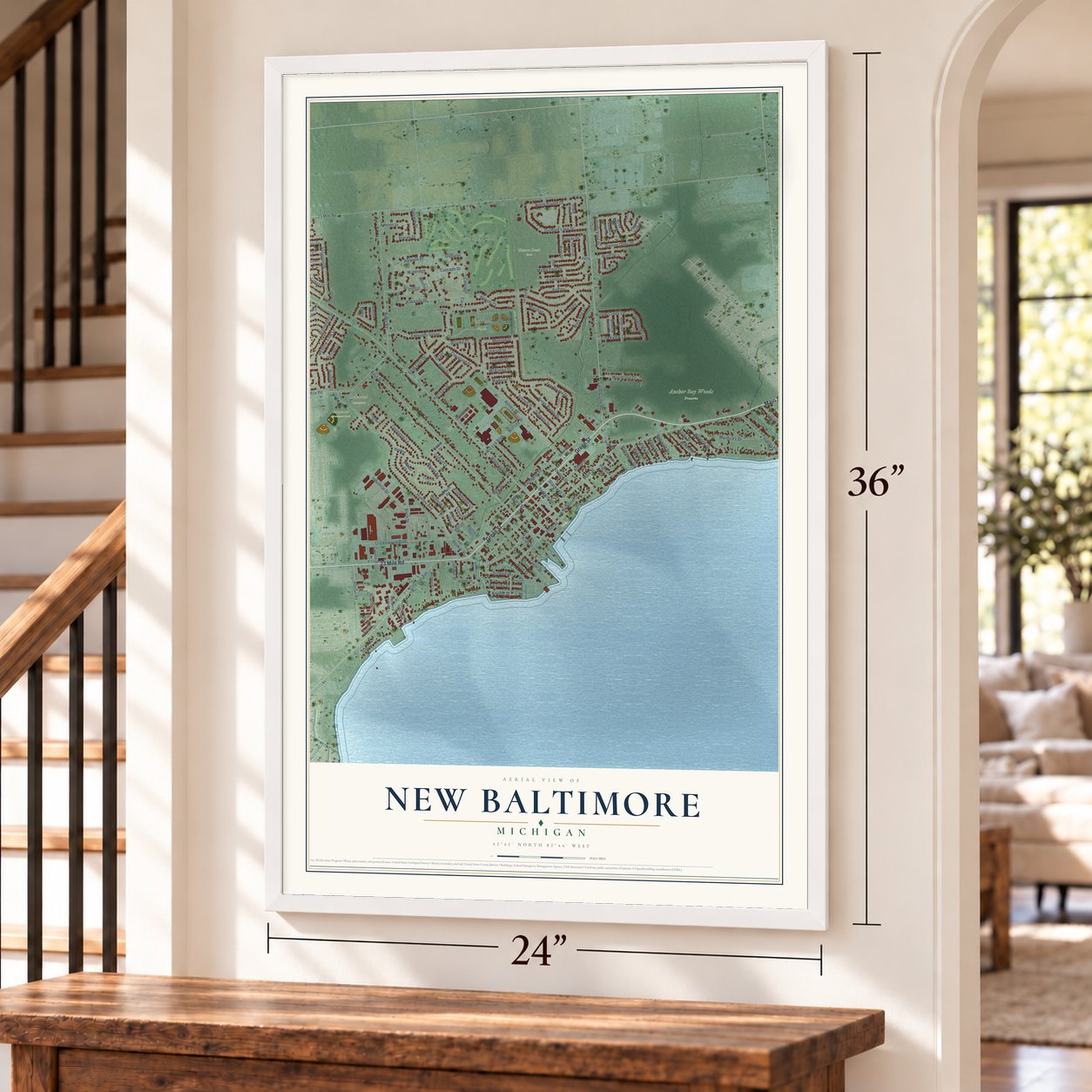 New Baltimore, Michigan map, 24 x 36 inch print in a white frame by a staircase