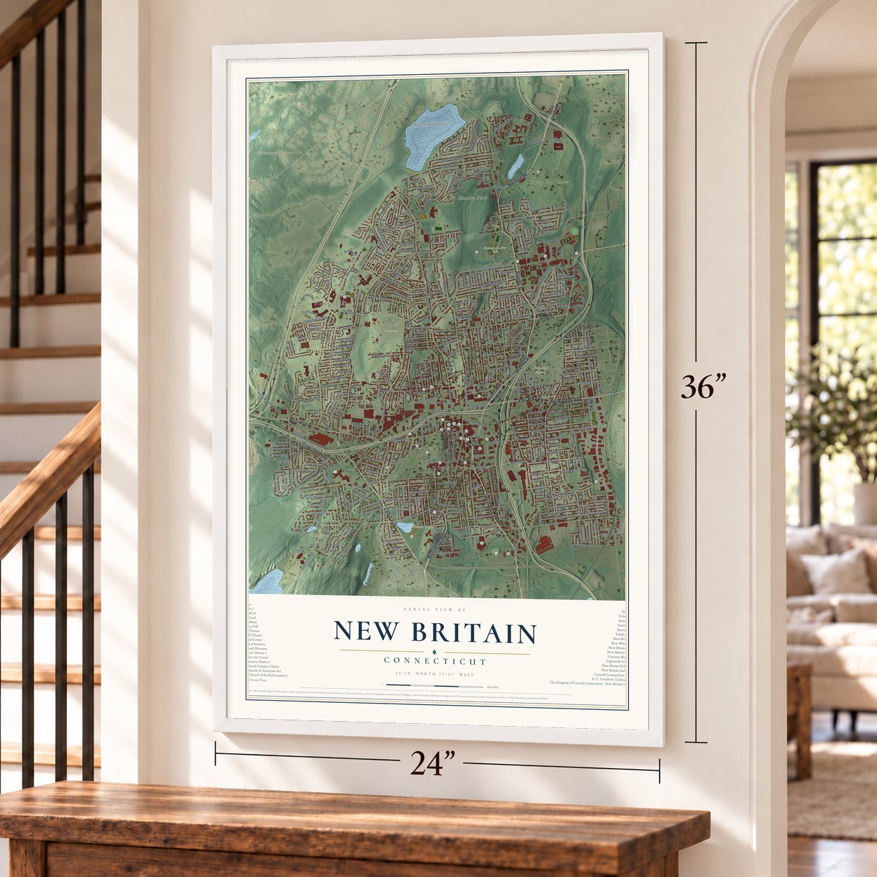 New Britain, Connecticut map, 24 x 36 inch print in a white frame by a staircase
