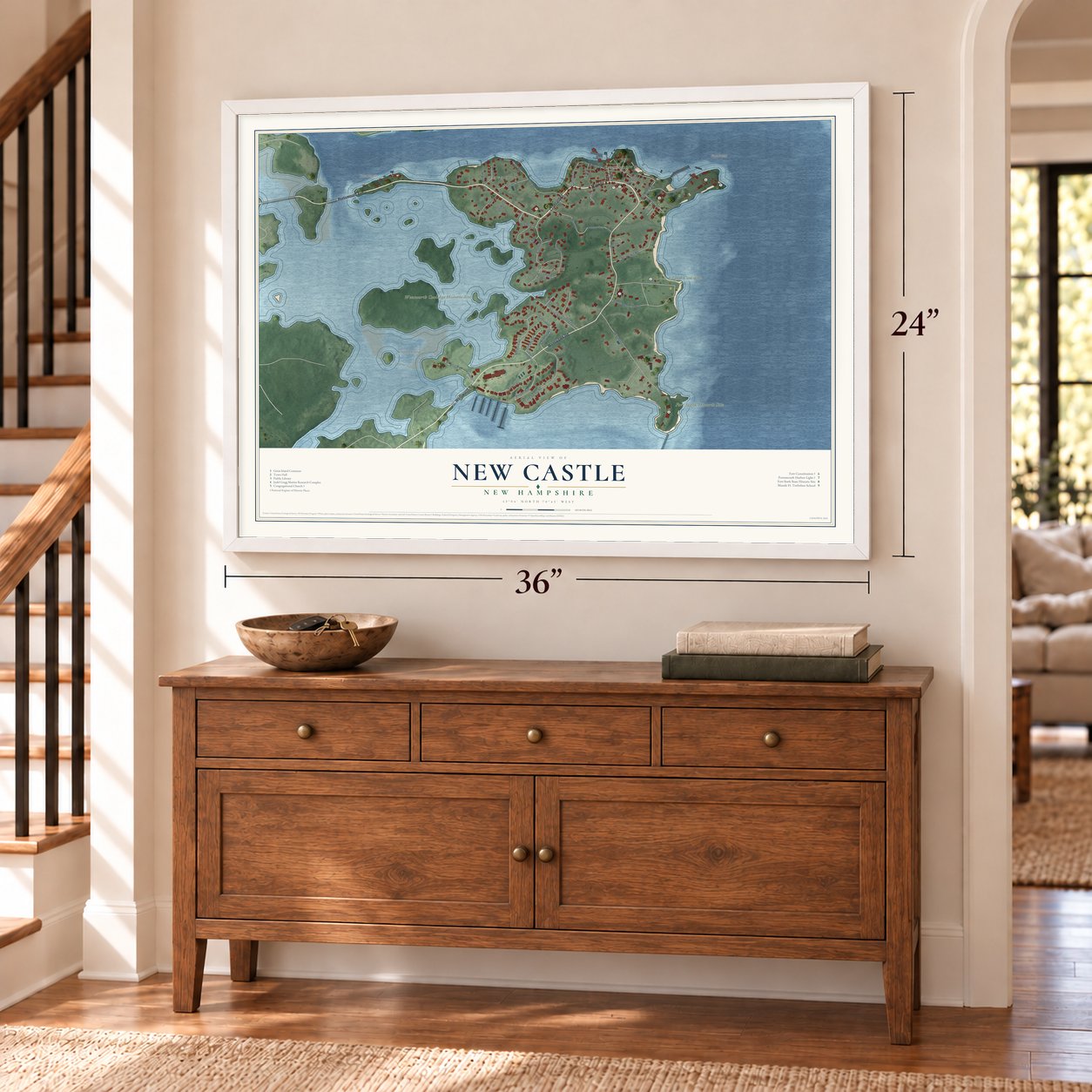New Castle, New Hampshire map, 24 x 36 inch print in a white frame above a dresser by a staircase