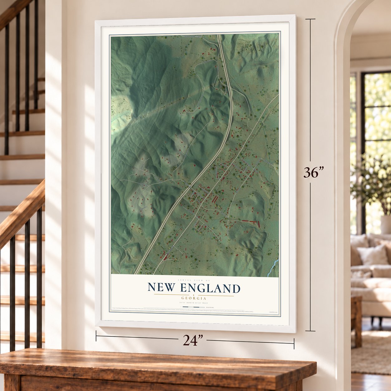 New England, Georgia map, 24 x 36 inch print in a white frame by a staircase