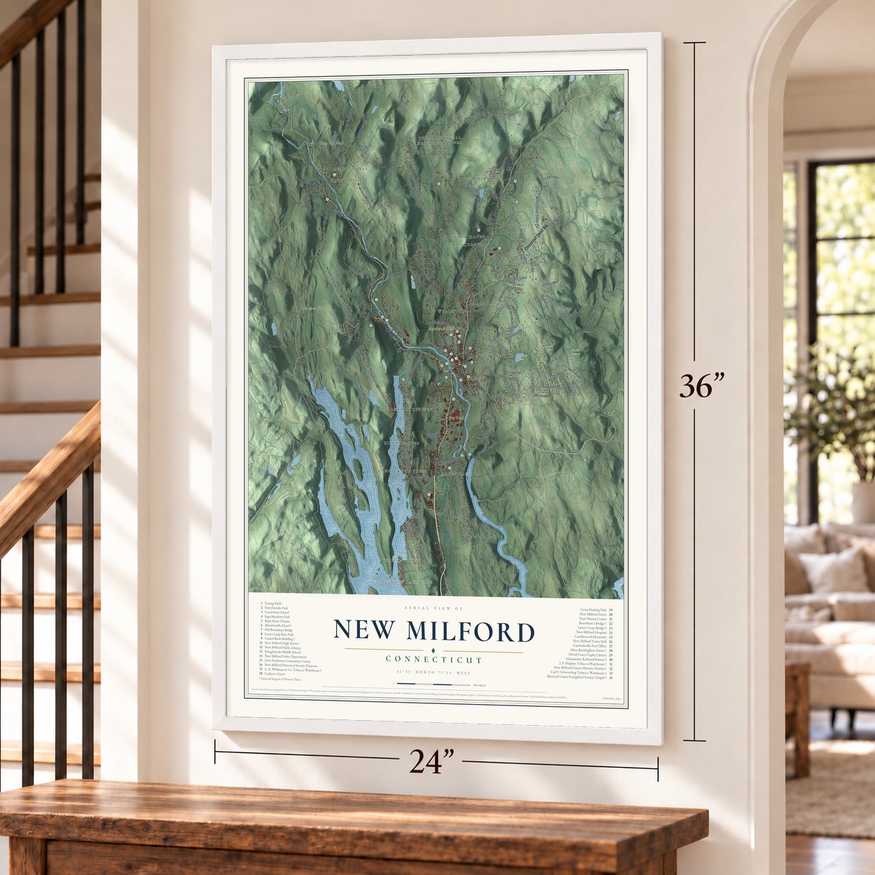 New Milford, Connecticut map, 24 x 36 inch print in a white frame by a staircase