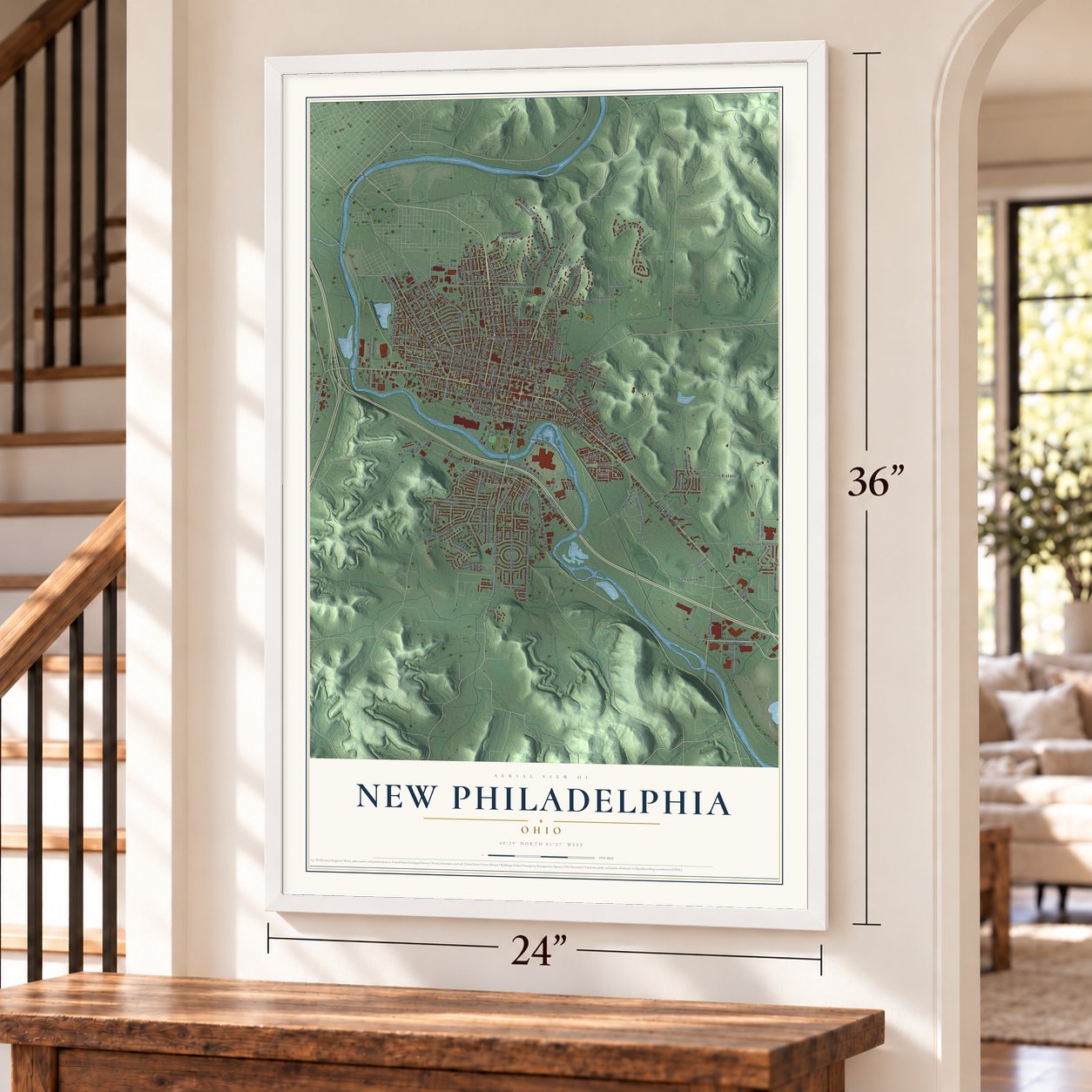 New Philadelphia, Ohio map, 24 x 36 inch print in a white frame by a staircase