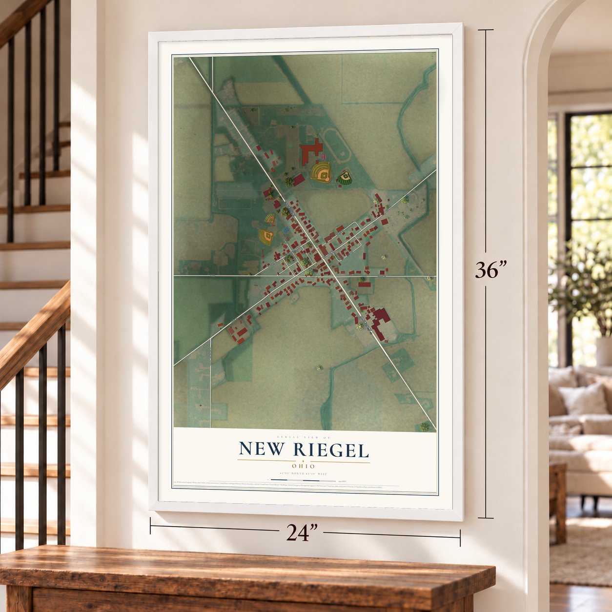 New Riegel, Ohio map, 24 x 36 inch print in a white frame by a staircase