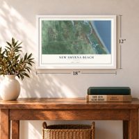New Smyrna Beach, Florida map, 12 x 18 inch print in a white frame in an entryway