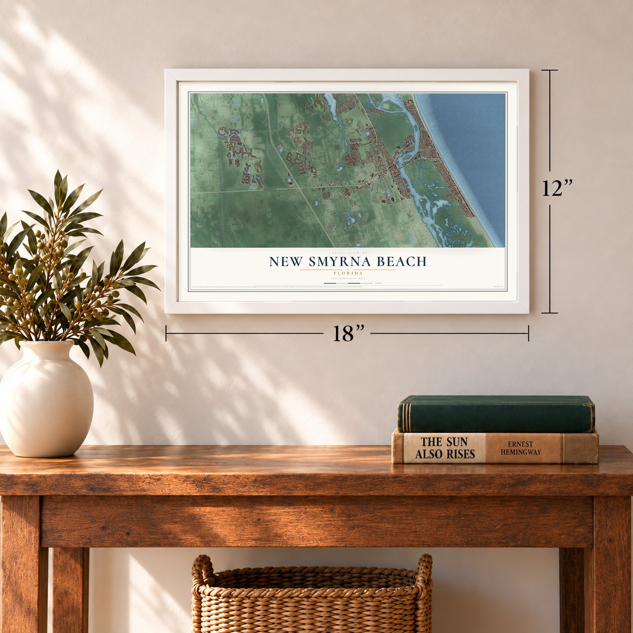 New Smyrna Beach, Florida map, 12 x 18 inch print in a white frame in an entryway