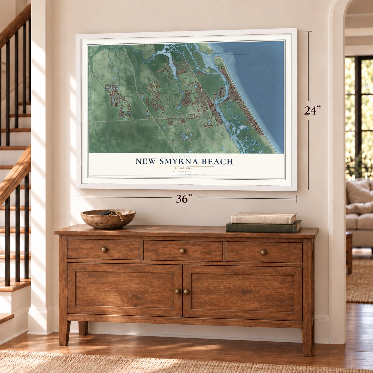 New Smyrna Beach, Florida map, 24 x 36 inch print in a white frame above a dresser by a staircase