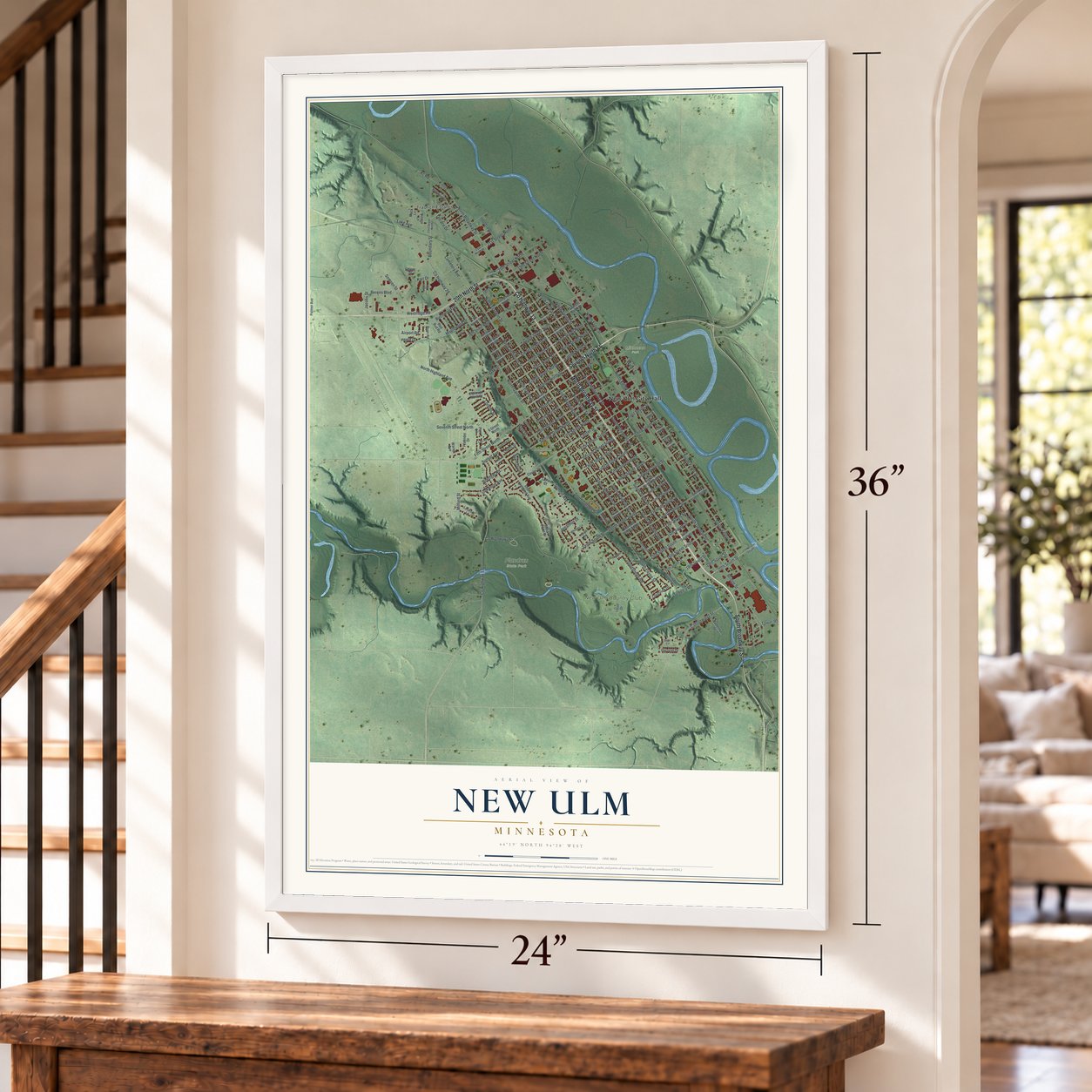 New Ulm, Minnesota map, 24 x 36 inch print in a white frame by a staircase