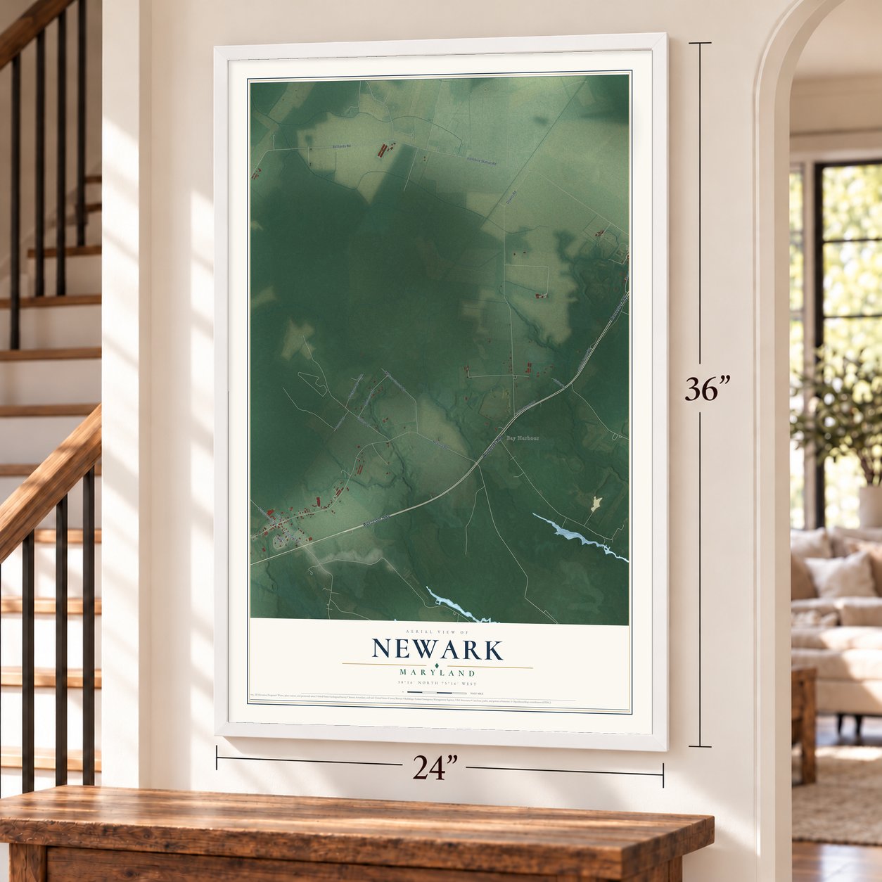 Newark, Maryland map, 24 x 36 inch print in a white frame by a staircase