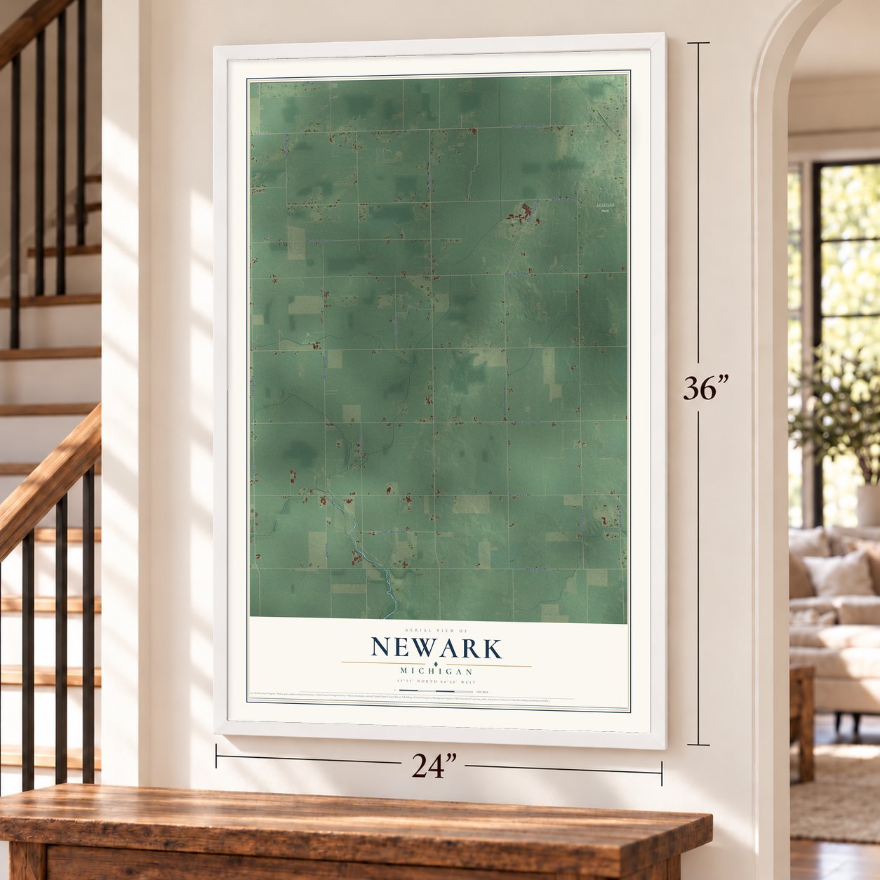 Newark, Michigan map, 24 x 36 inch print in a white frame by a staircase