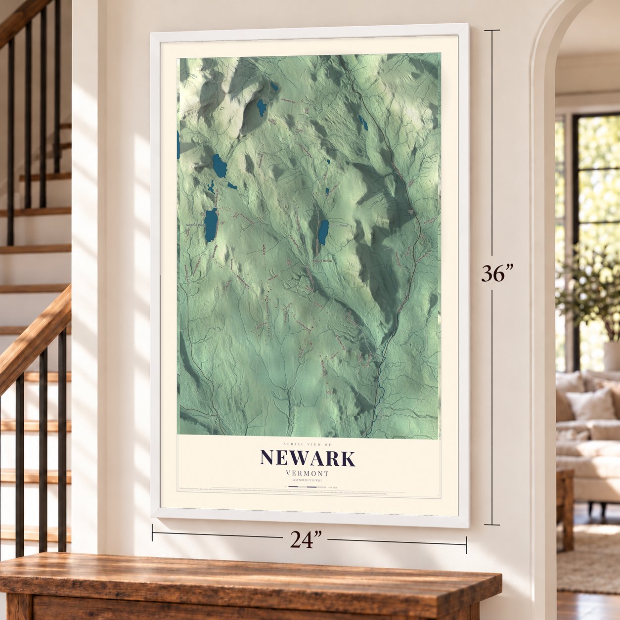 Newark, Vermont map, 24 x 36 inch print in a white frame by a staircase