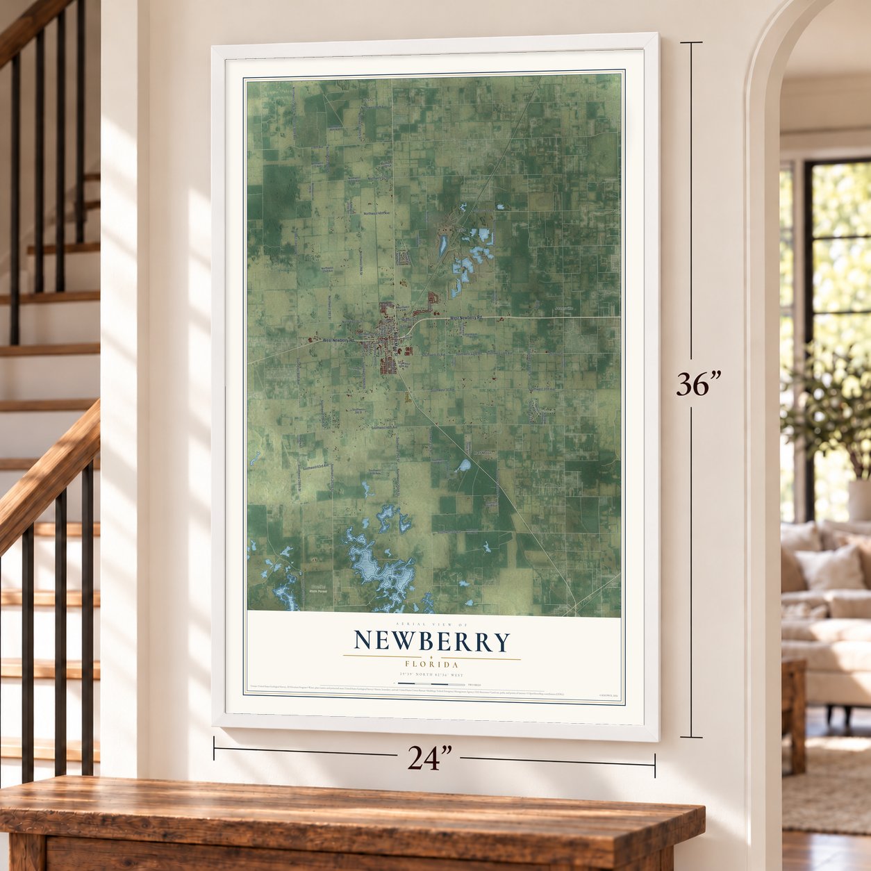 Newberry, Florida map, 24 x 36 inch print in a white frame by a staircase