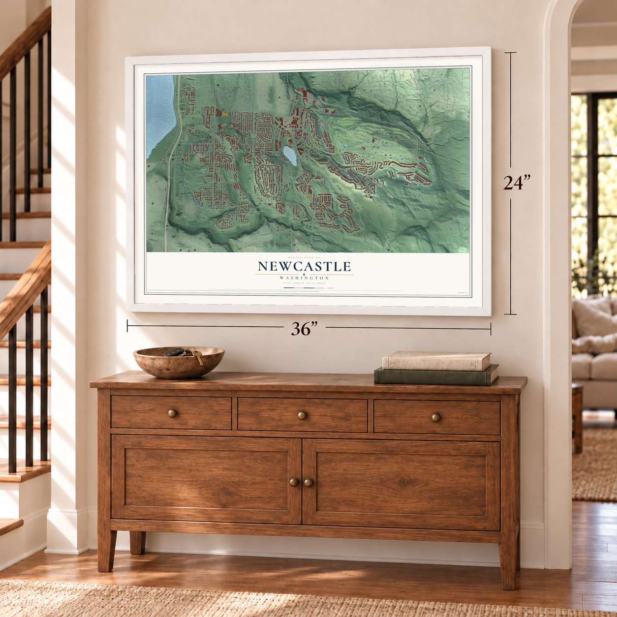 Newcastle, Washington map, 24 x 36 inch print in a white frame above a dresser by a staircase