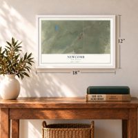 Newcomb, New Mexico map, 12 x 18 inch print in a white frame in an entryway