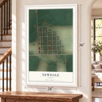 Newdale, Idaho map, 24 x 36 inch print in a white frame by a staircase