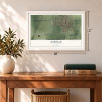 Newman, Illinois map, 12 x 18 inch print in a white frame in an entryway