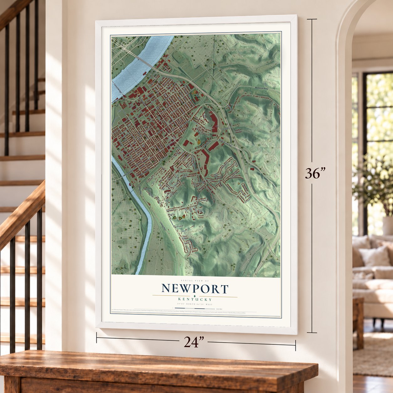 Newport, Kentucky map, 24 x 36 inch print in a white frame by a staircase