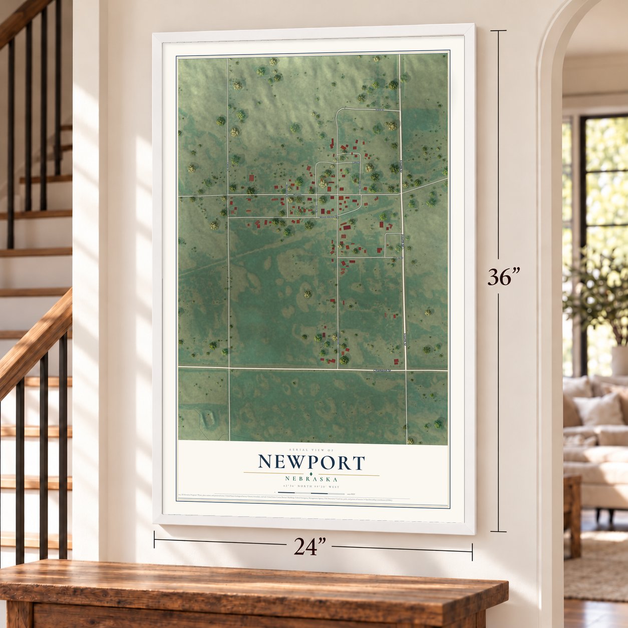 Newport, Nebraska map, 24 x 36 inch print in a white frame by a staircase