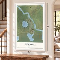 Newtok, Alaska map, 24 x 36 inch print in a white frame by a staircase