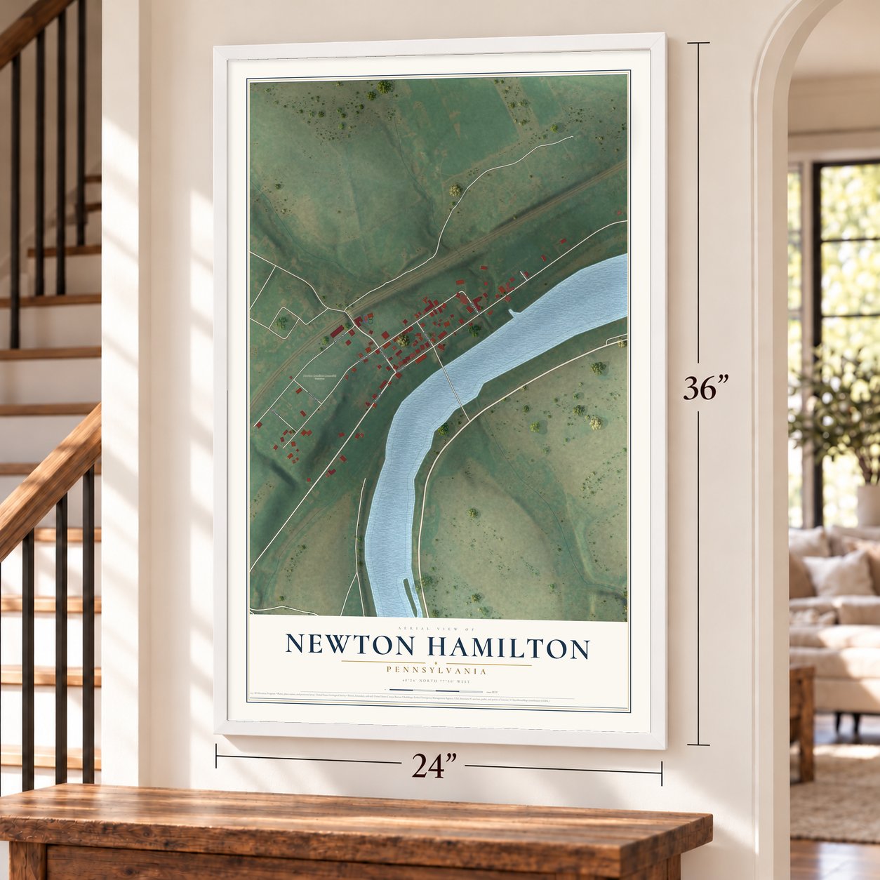 Newton Hamilton, Pennsylvania map, 24 x 36 inch print in a white frame by a staircase