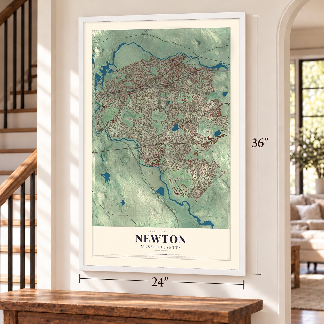 Newton, Massachusetts map, 24 x 36 inch print in a white frame by a staircase