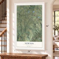 Newton, Pennsylvania map, 24 x 36 inch print in a white frame by a staircase