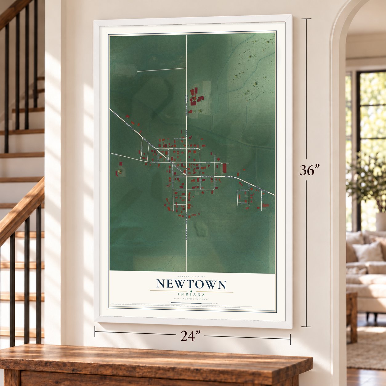 Newtown, Indiana map, 24 x 36 inch print in a white frame by a staircase