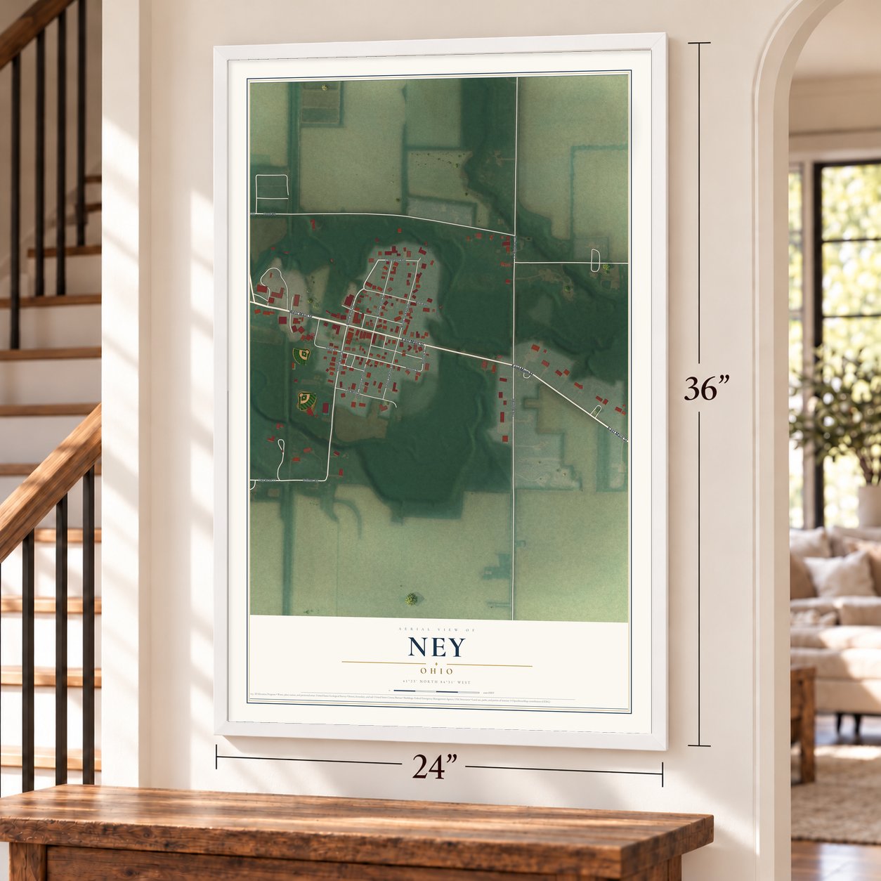 Ney, Ohio map, 24 x 36 inch print in a white frame by a staircase