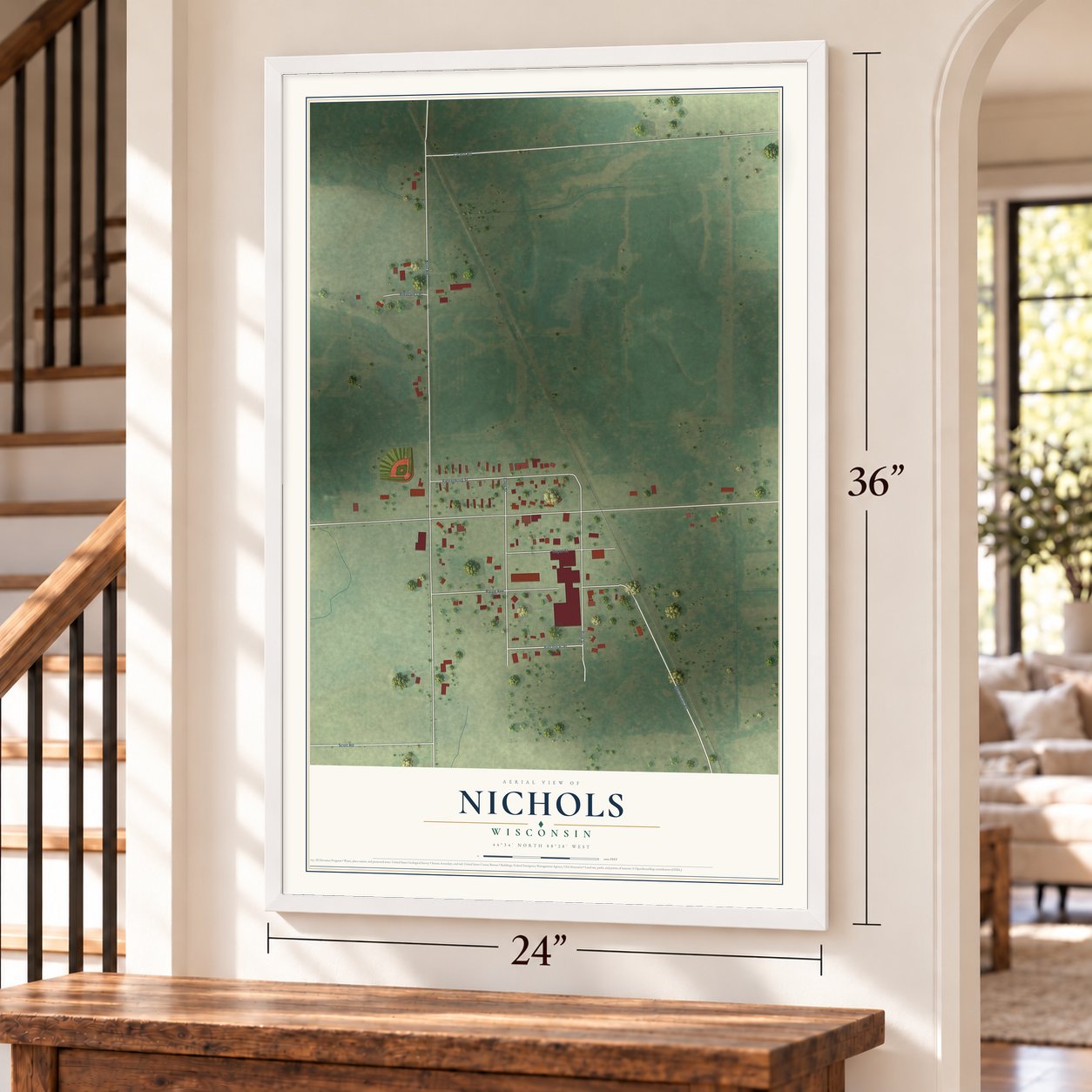 Nichols, Wisconsin map, 24 x 36 inch print in a white frame by a staircase