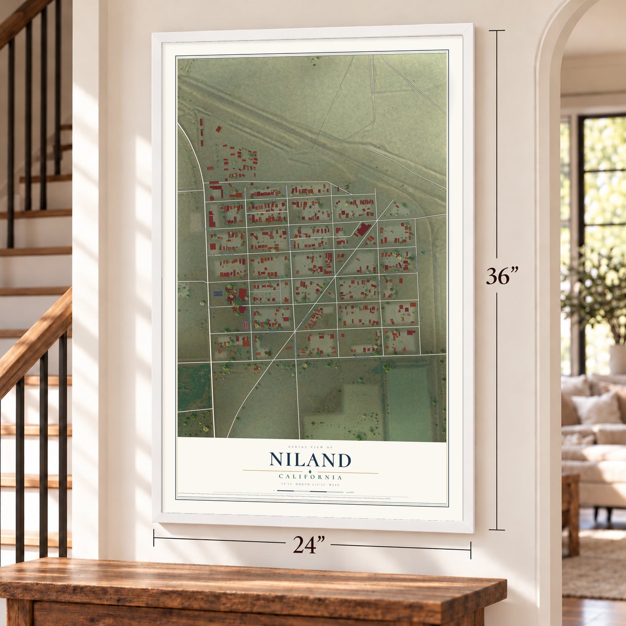 Niland, California map, 24 x 36 inch print in a white frame by a staircase