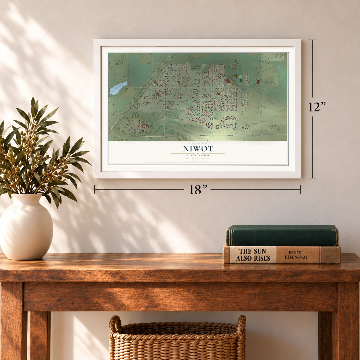 Niwot, Colorado map, 12 x 18 inch print in a white frame in an entryway