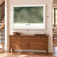 Nixon, Texas map, 24 x 36 inch print in a white frame above a dresser by a staircase