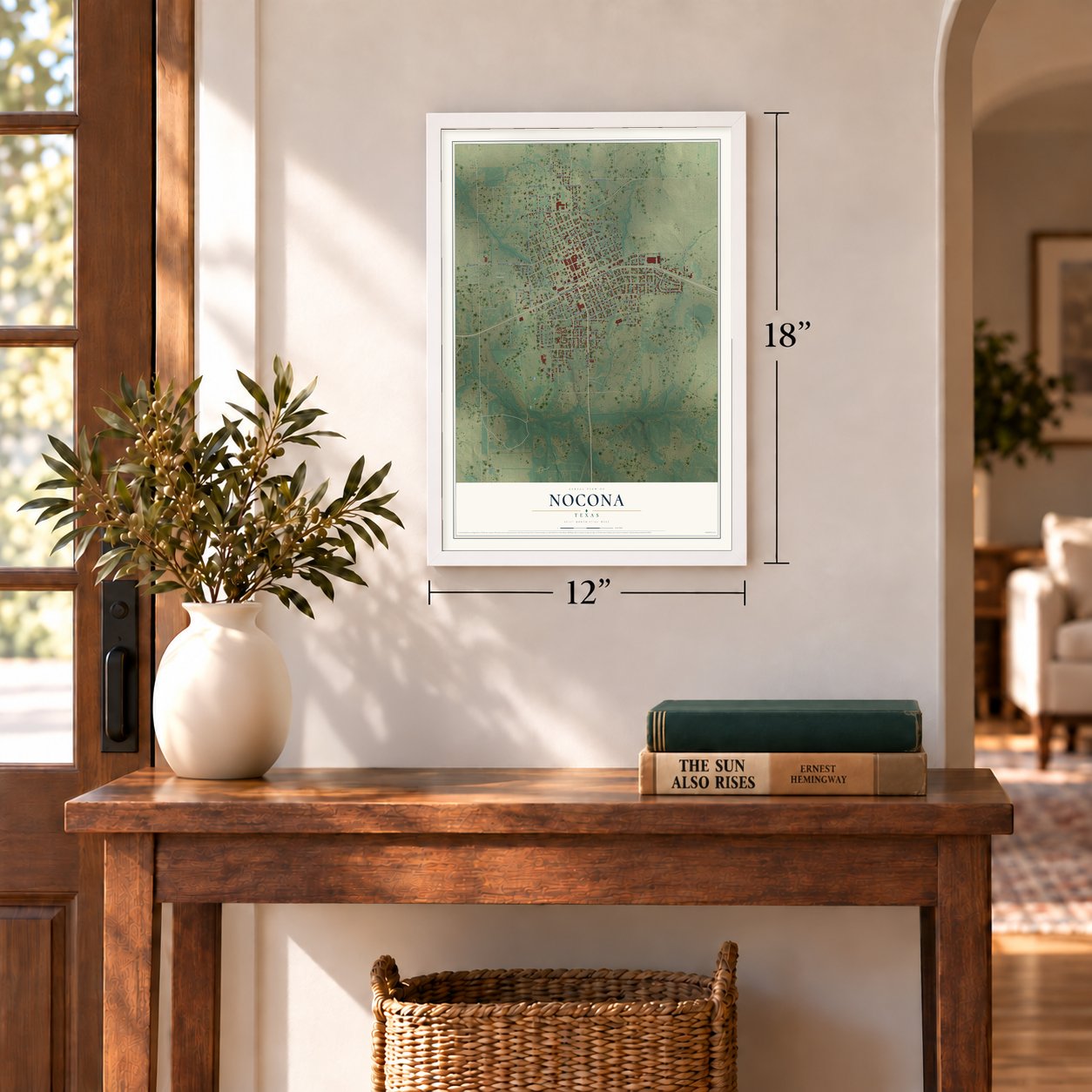 Nocona, Texas map, 12 x 18 inch print in a white frame in an entryway