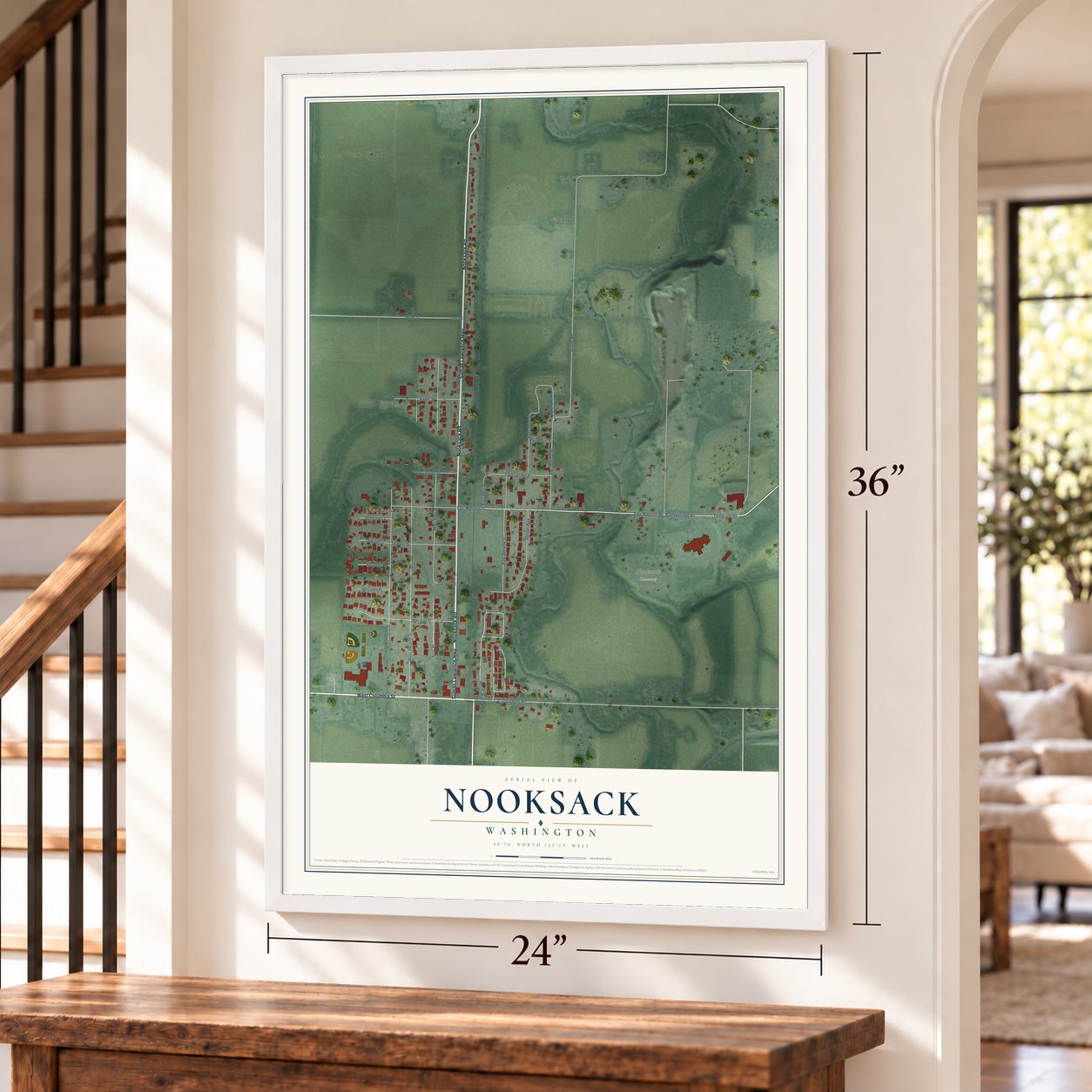 Nooksack, Washington map, 24 x 36 inch print in a white frame by a staircase