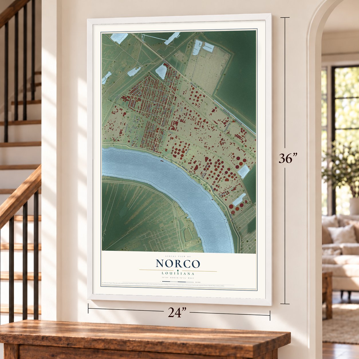 Norco, Louisiana map, 24 x 36 inch print in a white frame by a staircase