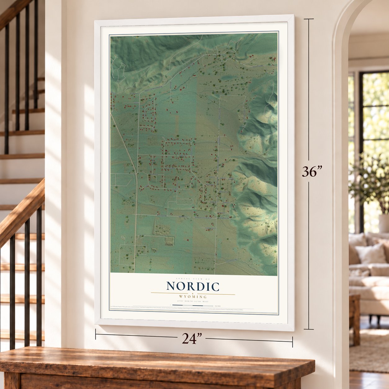 Nordic, Wyoming map, 24 x 36 inch print in a white frame by a staircase