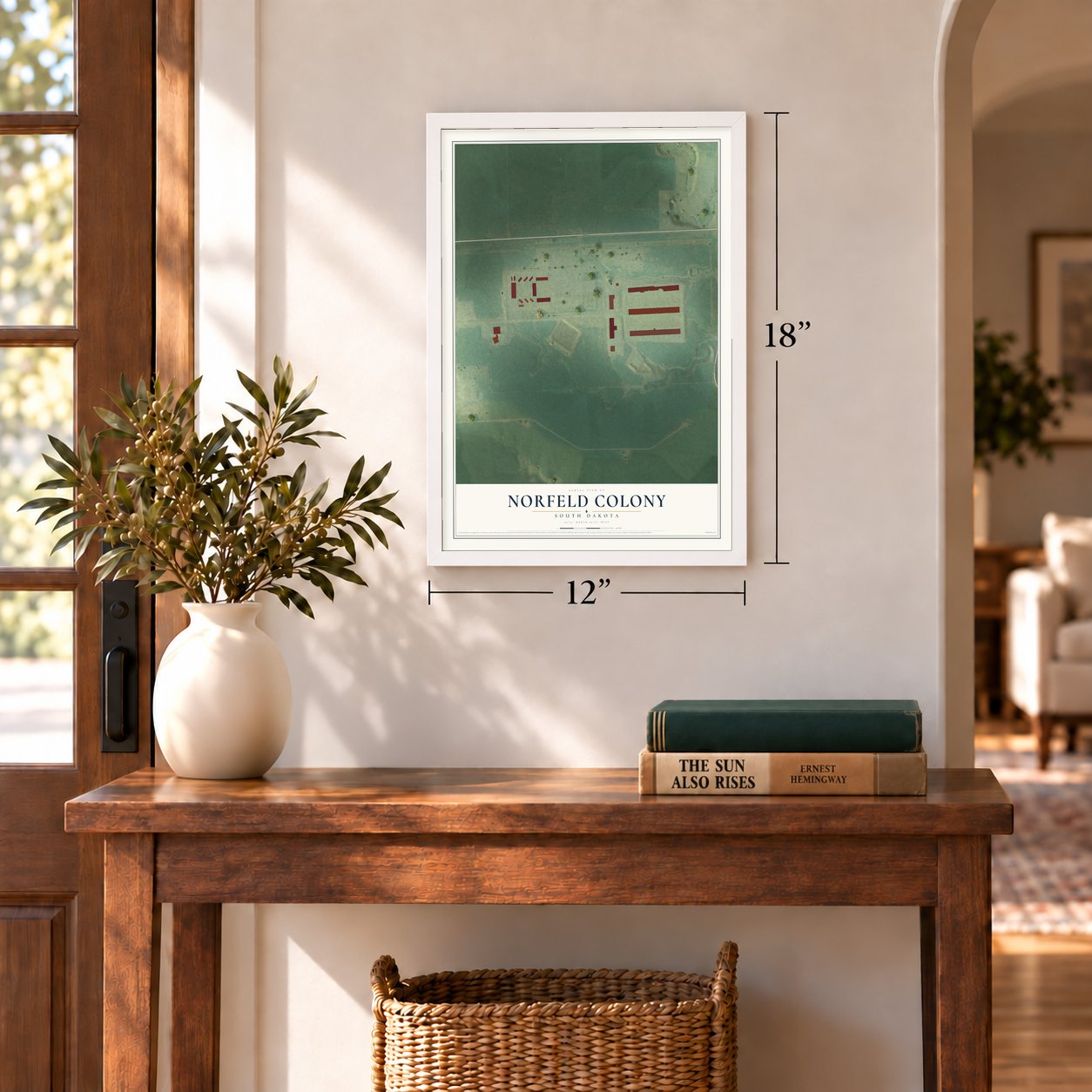 Norfeld Colony, South Dakota map, 12 x 18 inch print in a white frame in an entryway
