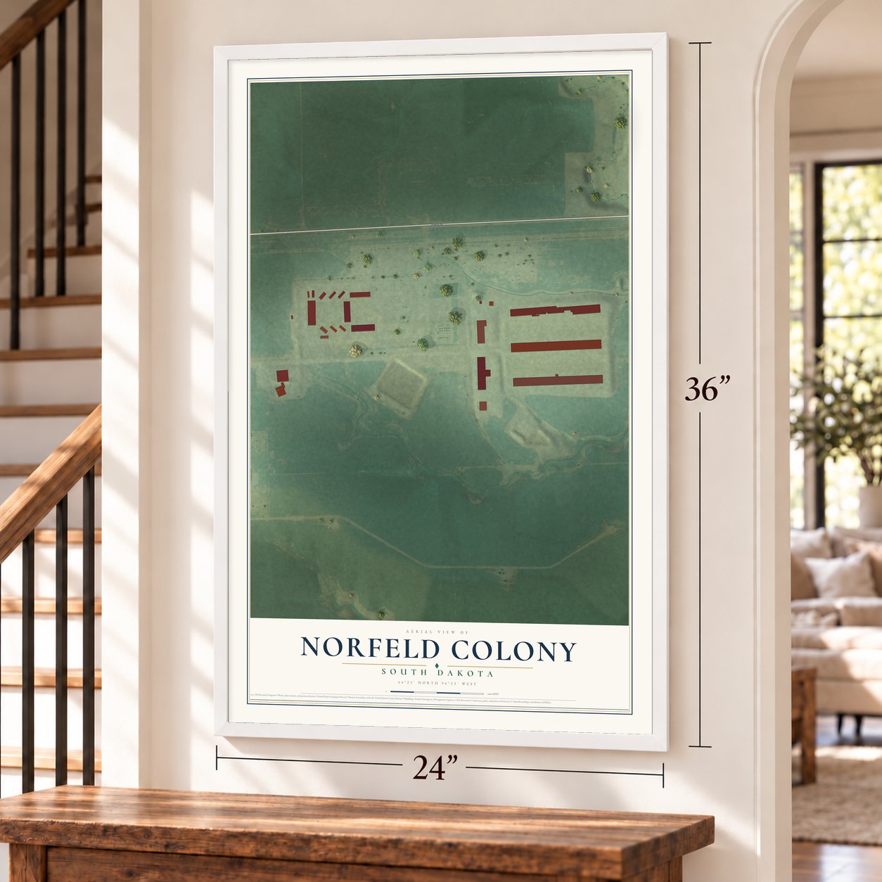 Norfeld Colony, South Dakota map, 24 x 36 inch print in a white frame by a staircase